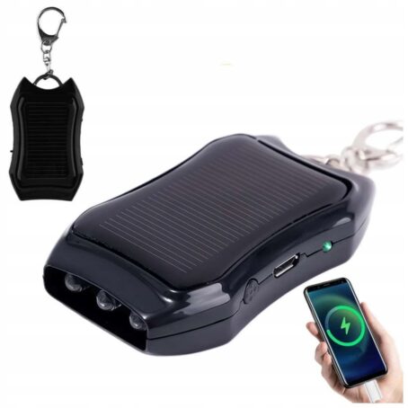 Kompaktowy, czarny ogrzewacz do rąk z panelem solarnym i breloczkiem, wyposażony w latarkę, port USB i funkcję ładowania telefonu, przedstawiony na zbliżeniach wraz z dołączonym breloczkiem.